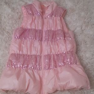 A pink winter vest